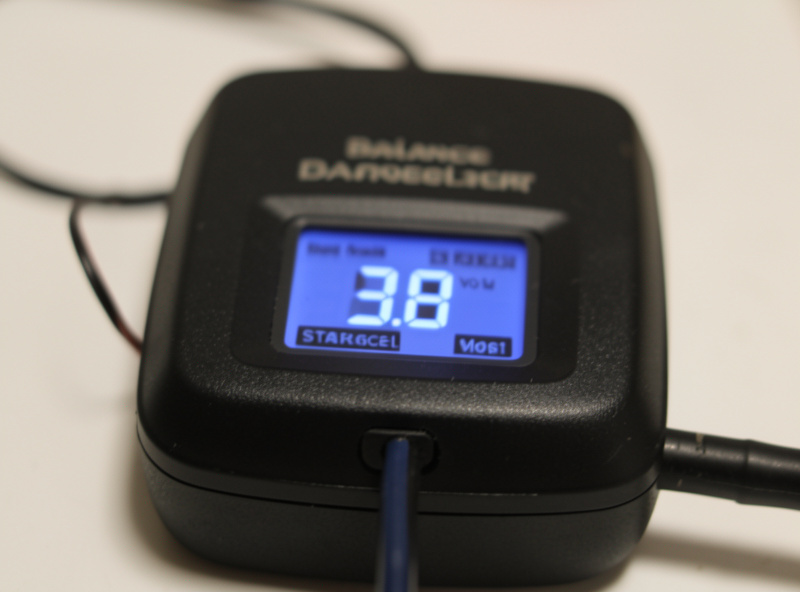 A balance charger display showing a LiPo pack being brought to storage voltage of 3.8 volts per cell